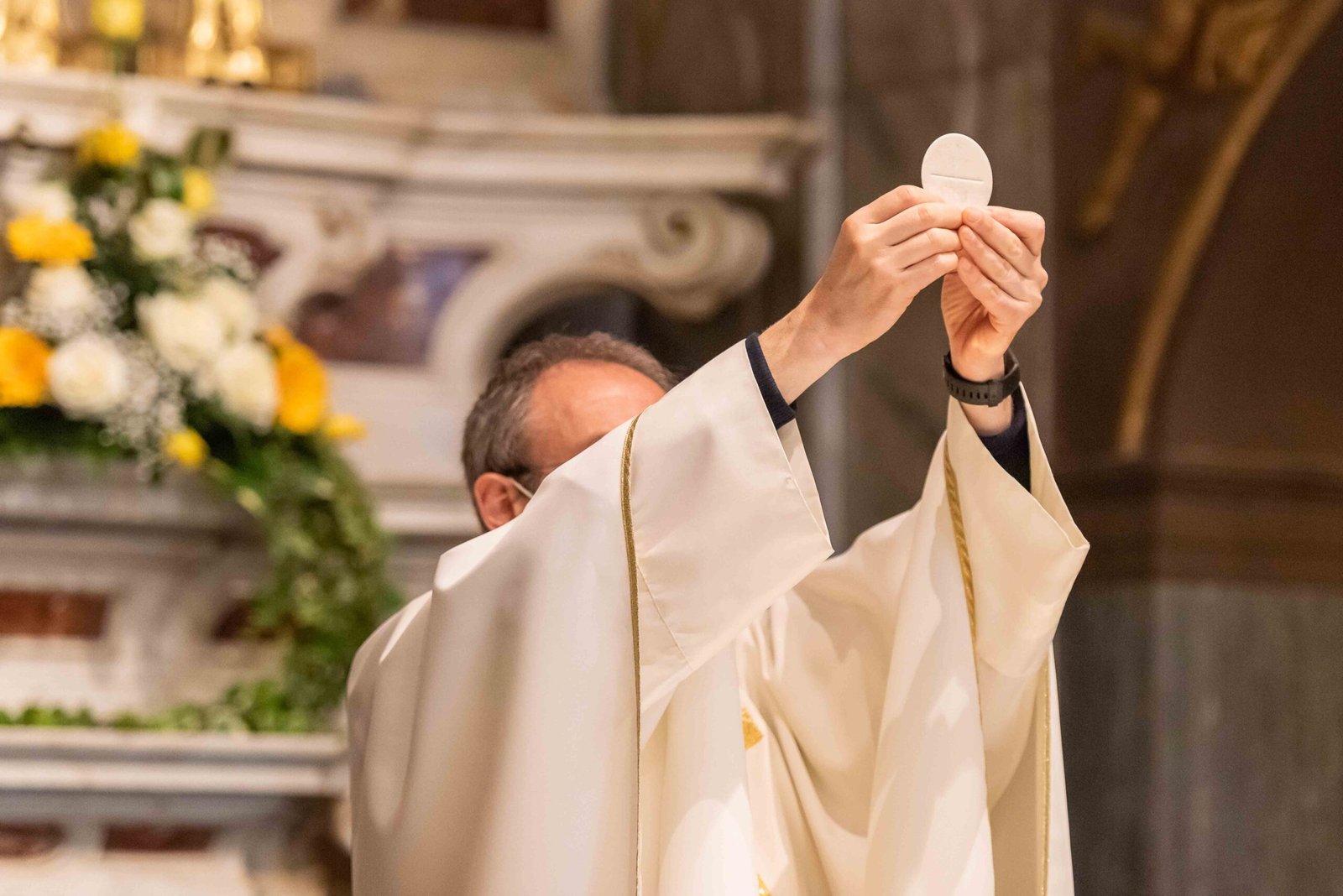 The elevation of the Sacramental Bread during the catholic liturgy